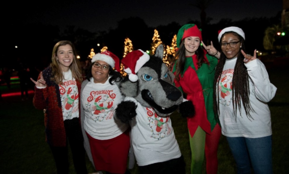 People wearing red and green